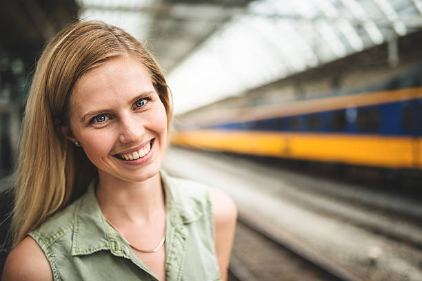 istock smiling tourist on the station 501576839