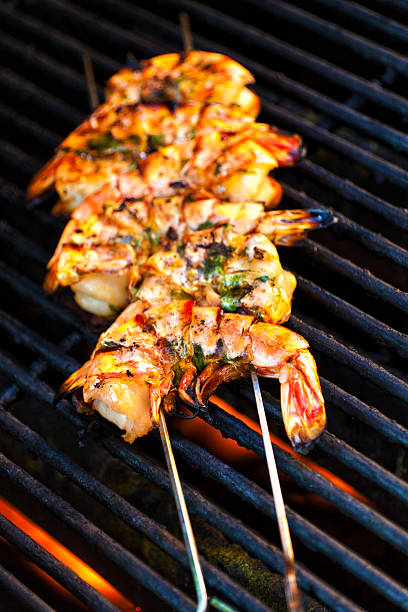 grilled jumbo shrimps on skews, ready to eat