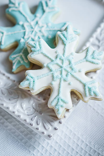 istock Snowflake cookies on white pastel background 501579174