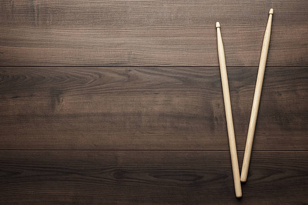 istock wooden drumsticks on wooden table 501579914