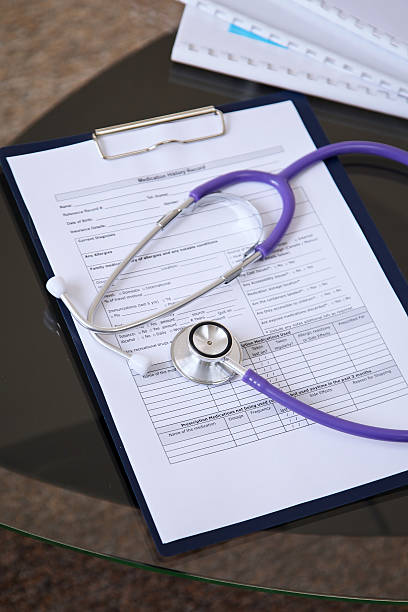 istock Stethoscope on the glass desk 501598050