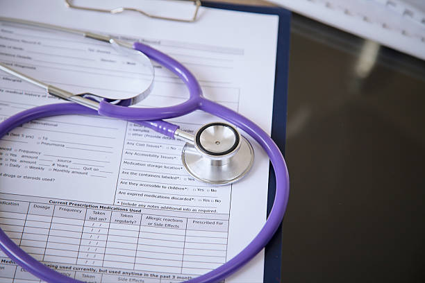 istock Stethoscope on the glass desk 501598158