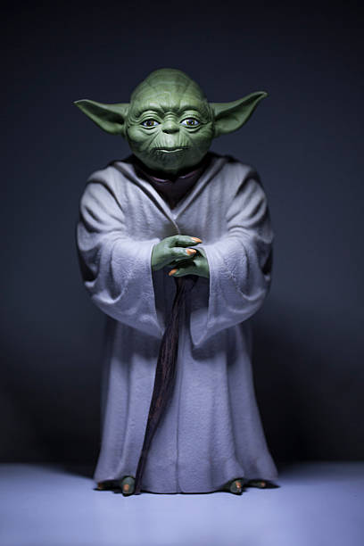 Master Yoda istanbul, Turkey - February 24, 2015: Portrait of Jedi Master Yoda toy model, from director George Lucas's legend Star Wars Film. star wars stock pictures, royalty-free photos & images
