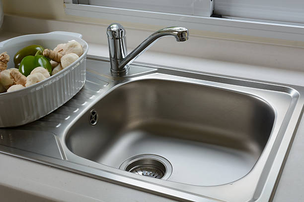 washbasin in a kitchen Close up of washbasin in a kitchen kitchen sink photos stock pictures, royalty-free photos & images