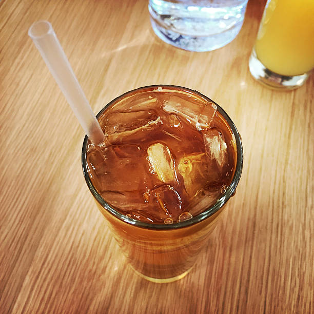 istock Glass of Iced Tea with Straw 501600600
