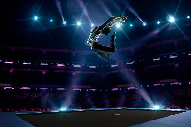 istock Young girl is jumping on trampoline 501601600