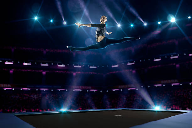 istock Young girl is jumping on trampoline 501601608