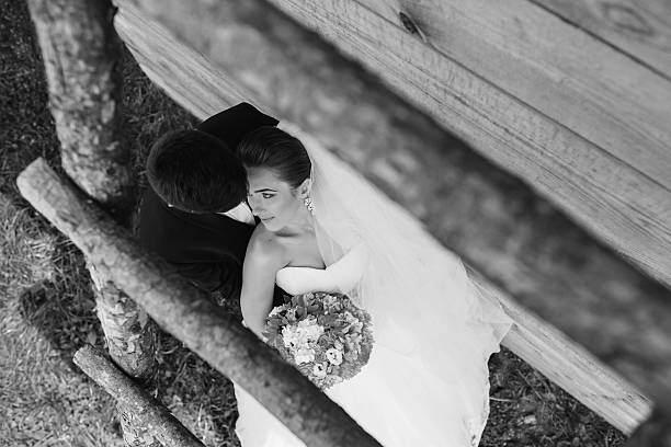 istock beautiful young wedding couple outdoors 501602076