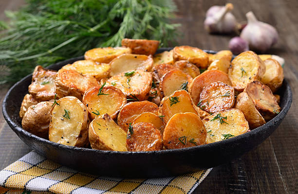 istock Potato baked with dill in pan 501602780