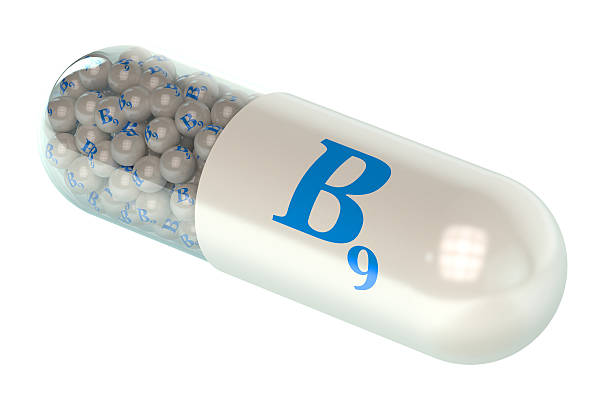 istock Vitamin capsule b9 folic acid element 501604772