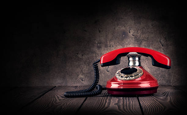 istock Old red telephone 501605960