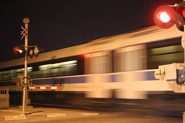 istock Train Speeding in Railway Crossing 501606910