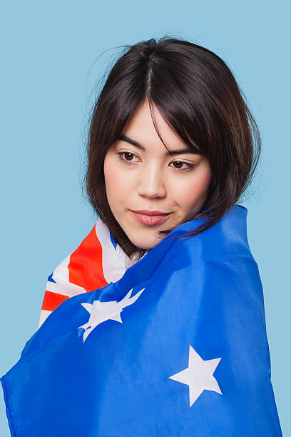 istock Patriotic young woman wrapped in flag 501613031