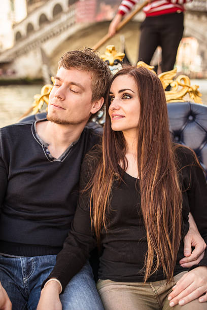 istock romantic couple togetherness on the gondola in venice 501613563