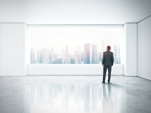 istock Young businessman standing in bright office 501614239