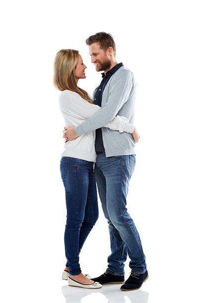 istock Couple embracing and looking into each others eyes 501614715