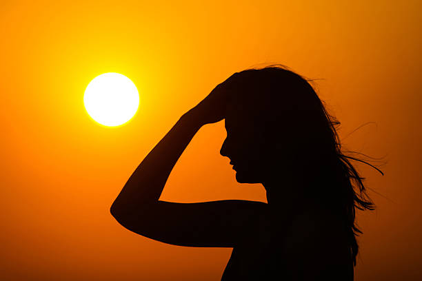istock Woman enjoying sunset 501615791