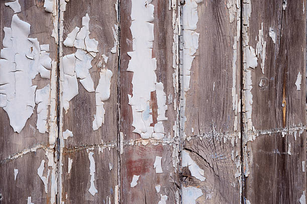 istock Weathered paint on a wooden fence 501616227
