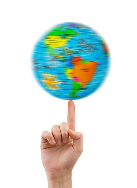 Hand and spinning globe Hand and spinning globe isolated on white background finger spinning globe stock pictures, royalty-free photos & images
