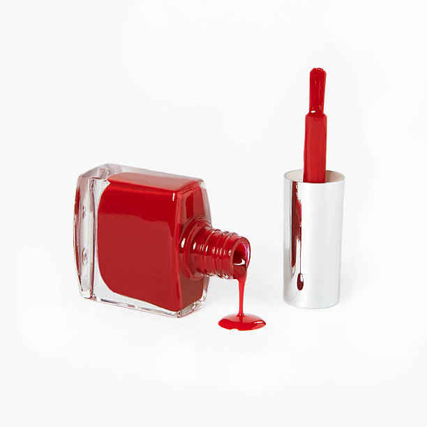 istock red open nail polish bottle on white background 501618440
