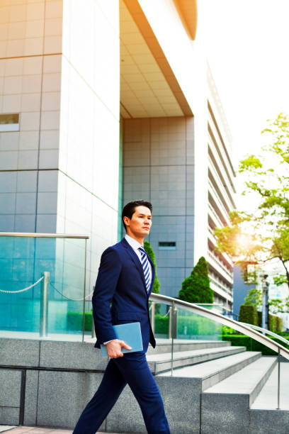 istock Japanese businessman with digital tablet, Tokyo. 501623268