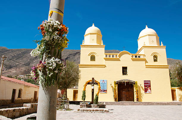Tilcara, Argentina - April 15, 2014: Iglesia de Tilcara in Argentina. The church is decorated for the Holy Week with flowers. Even the light polls get some dried flowers. 