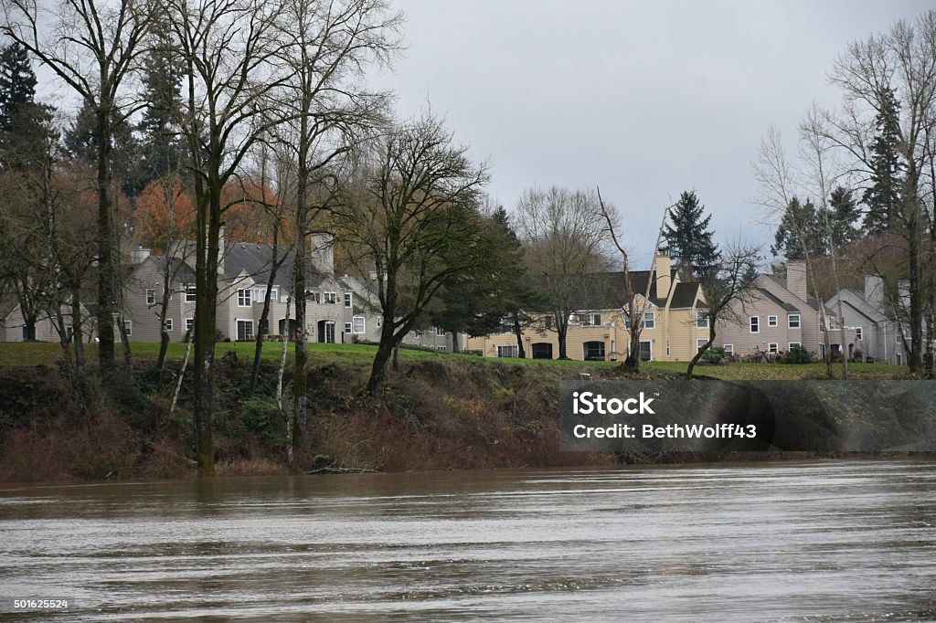 View of high water levels on the Willamette River Condo homes near the bank of the rising Willamette River in Wilsonville Oregon after torrential rain Wilsonville Stock Photo
