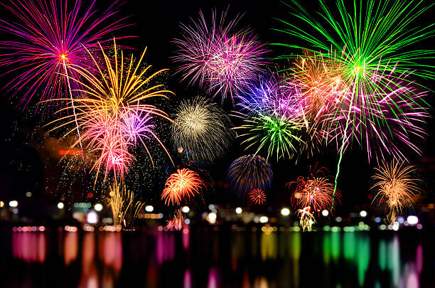 istock Fireworks celebration and the city night light background. 501625600