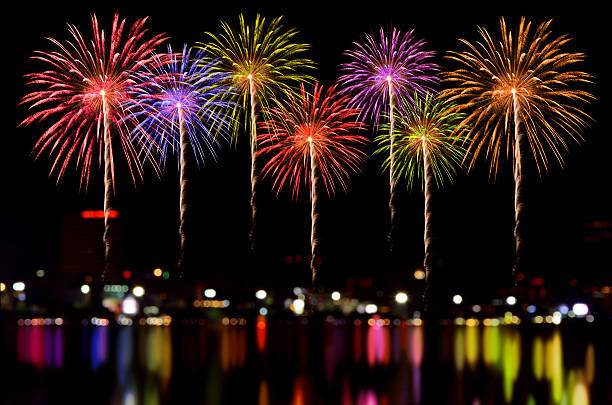istock Fireworks celebration and the city night light background. 501625672