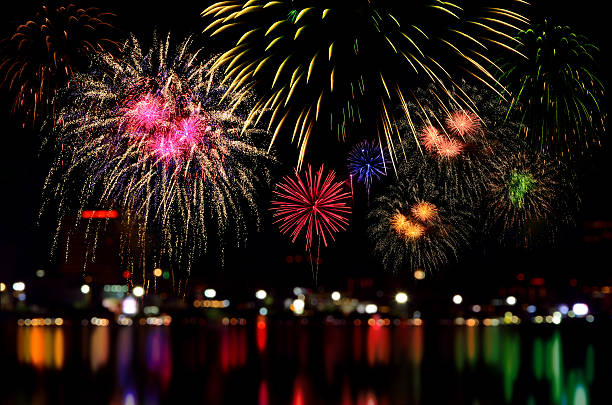 istock Fireworks celebration and the city night light background. 501625942