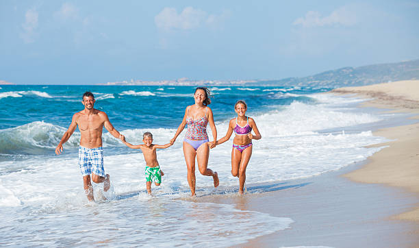 istock Family on the beach 501628578
