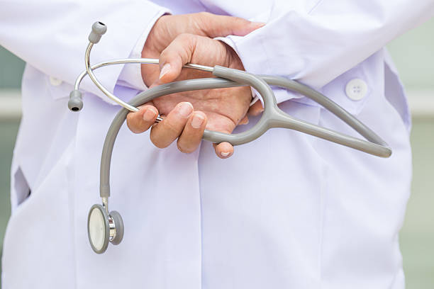 istock Doctor with stethoscope in a hospital 501629472