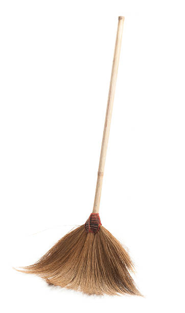 istock Old straw broomstick ready fly or sweep isolated 501629622