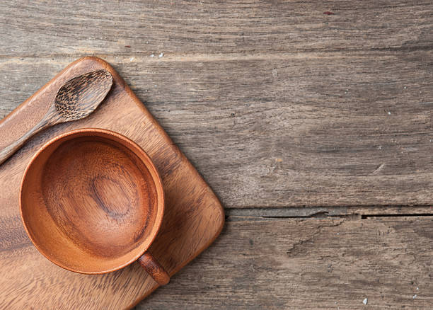 istock Wooden tea cup on table wood 501630258