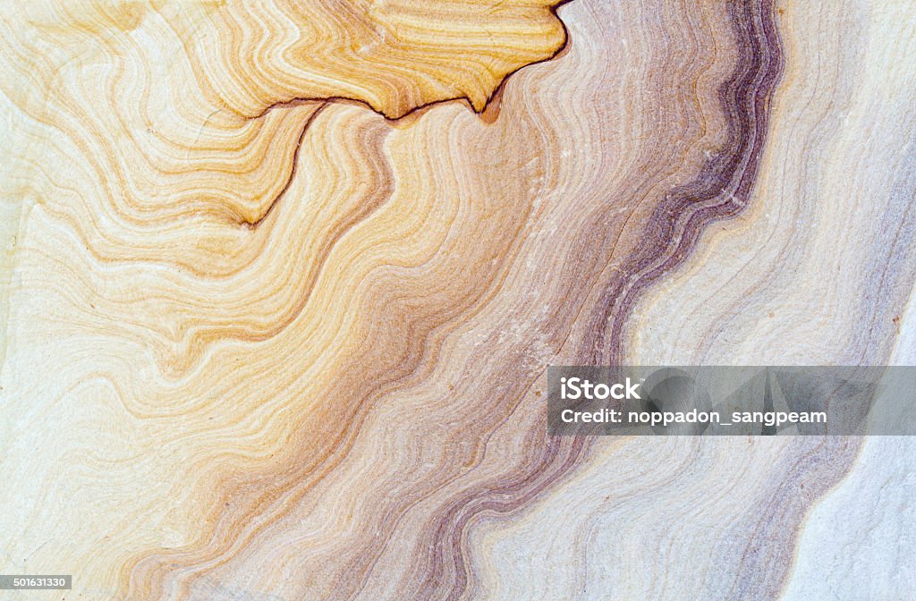 Sandstone texture , detailed structure of sandstone  for background and design. Patterned sandstone texture background (natural color). sandstone in Thailand, for a raw material and designs. Textured Stock Photo