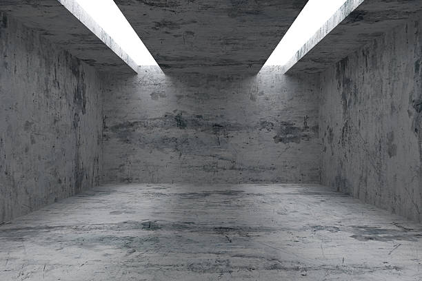 istock Empty room with concrete walls and opening in ceiling 501641260