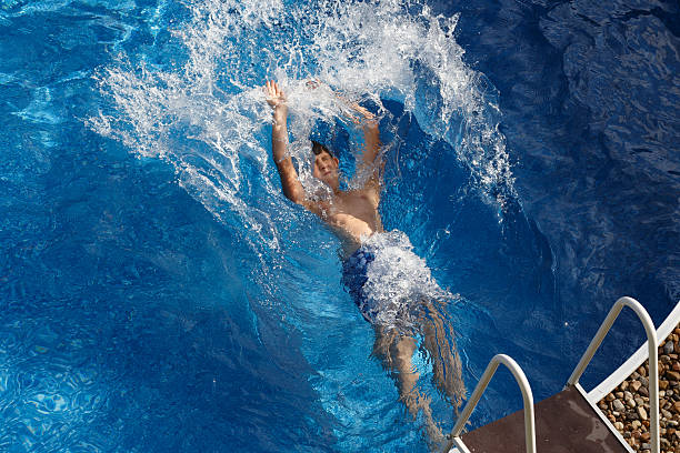 istock Boy in the swimming pool 501643464