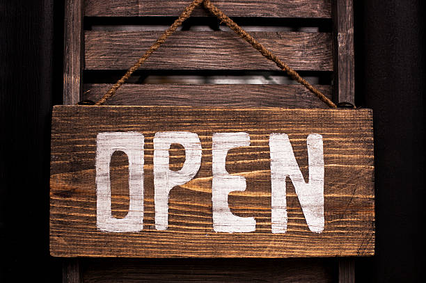 istock Open sign hanging in a door 501644470