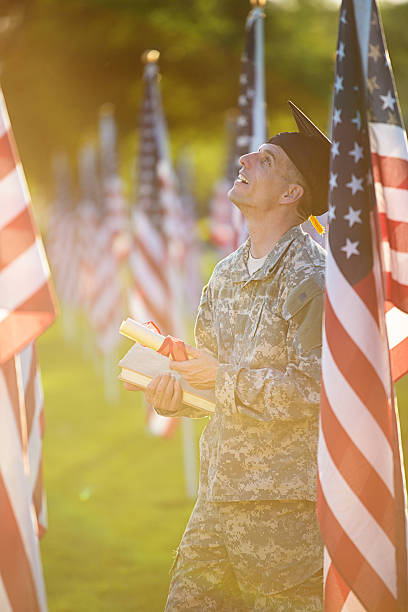 istock American Soldier with graduation hat 501644737