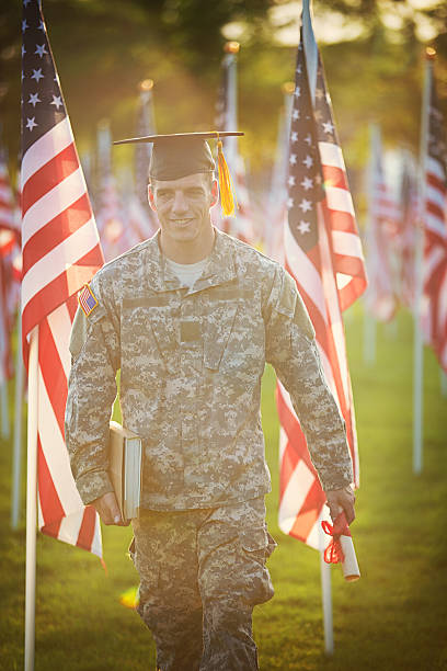 istock American Soldier with graduation hat 501644749