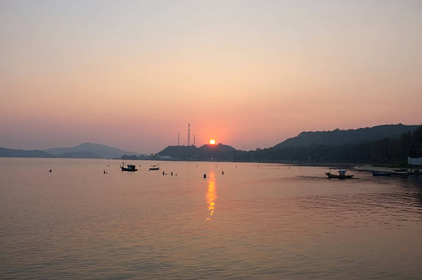 istock Sea and mountain at beach pier under sunset 501644944