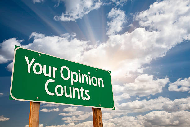istock Your Opinion Counts Green Road Sign 501645049