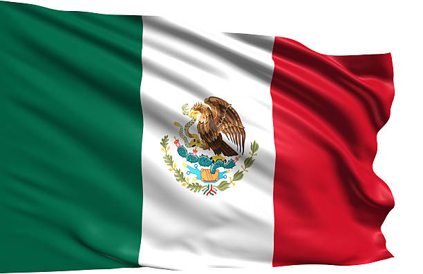 Mexican flag waving with a blue sky and a large cloud in the background