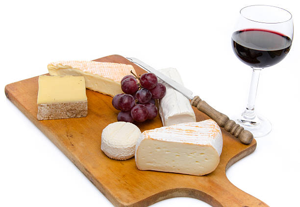 istock Composition of different cheeses on a wooden cutting board 501646181