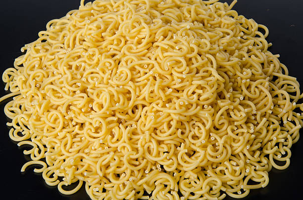 istock Mound of uncooked short spaghetti 501646383