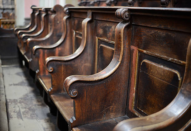 istock Wooden benches at the old cathedral 501646828