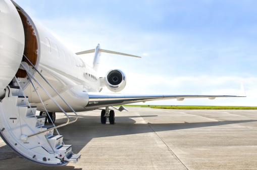 Stairs with Jet Engine on a modern private jet airplane - Bombardier Global Express