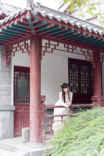 istock girl standing in the courtyard 501647604