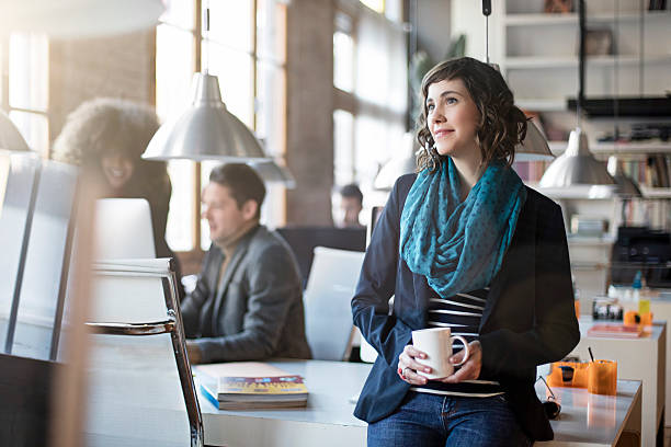 istock Portrait of smiling office worker relax having a coffee 501648762