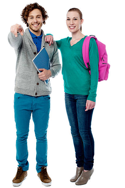 istock Girl resting her arm on classmates shoulder 501649703